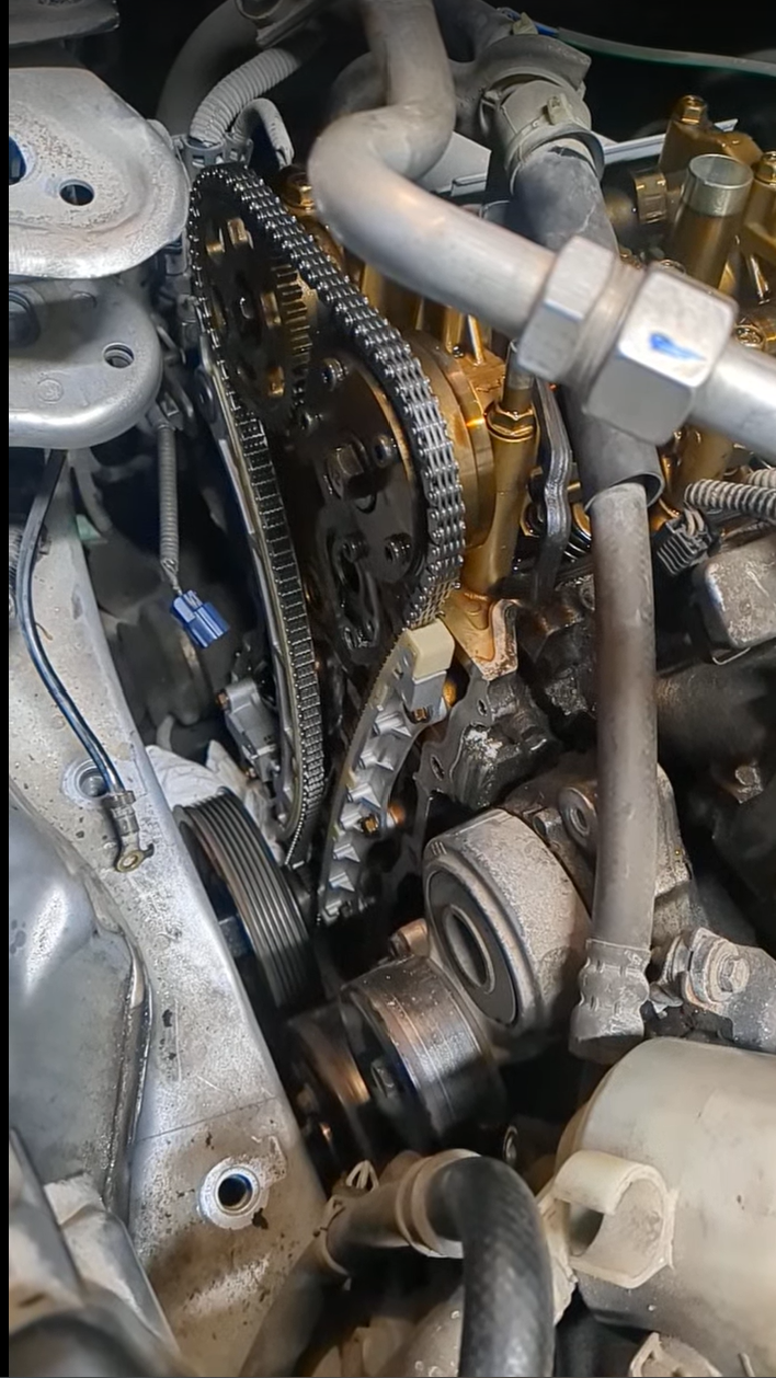 New timing chain installed on the front of the engine